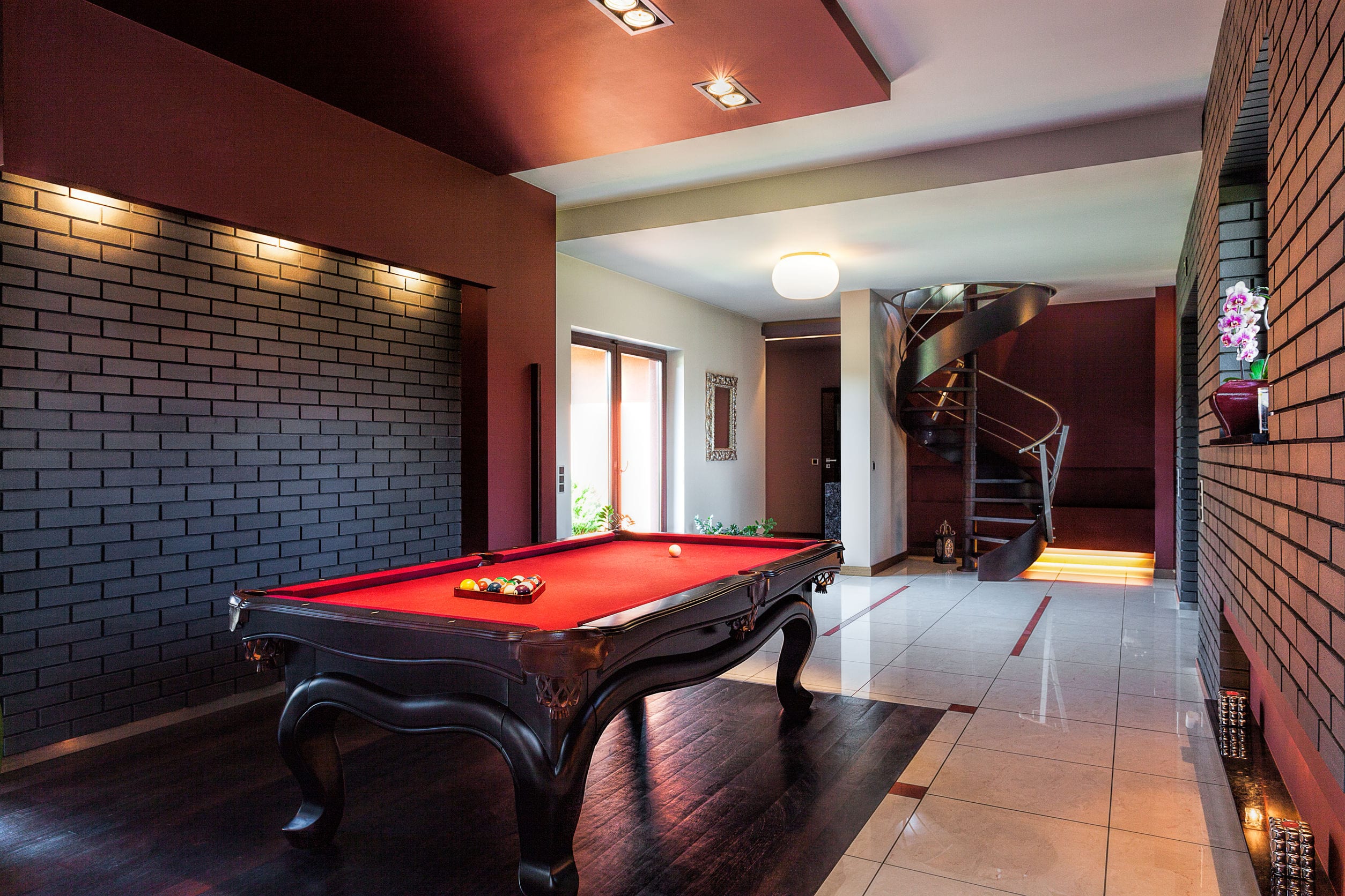 Billard table in the hall of private interior